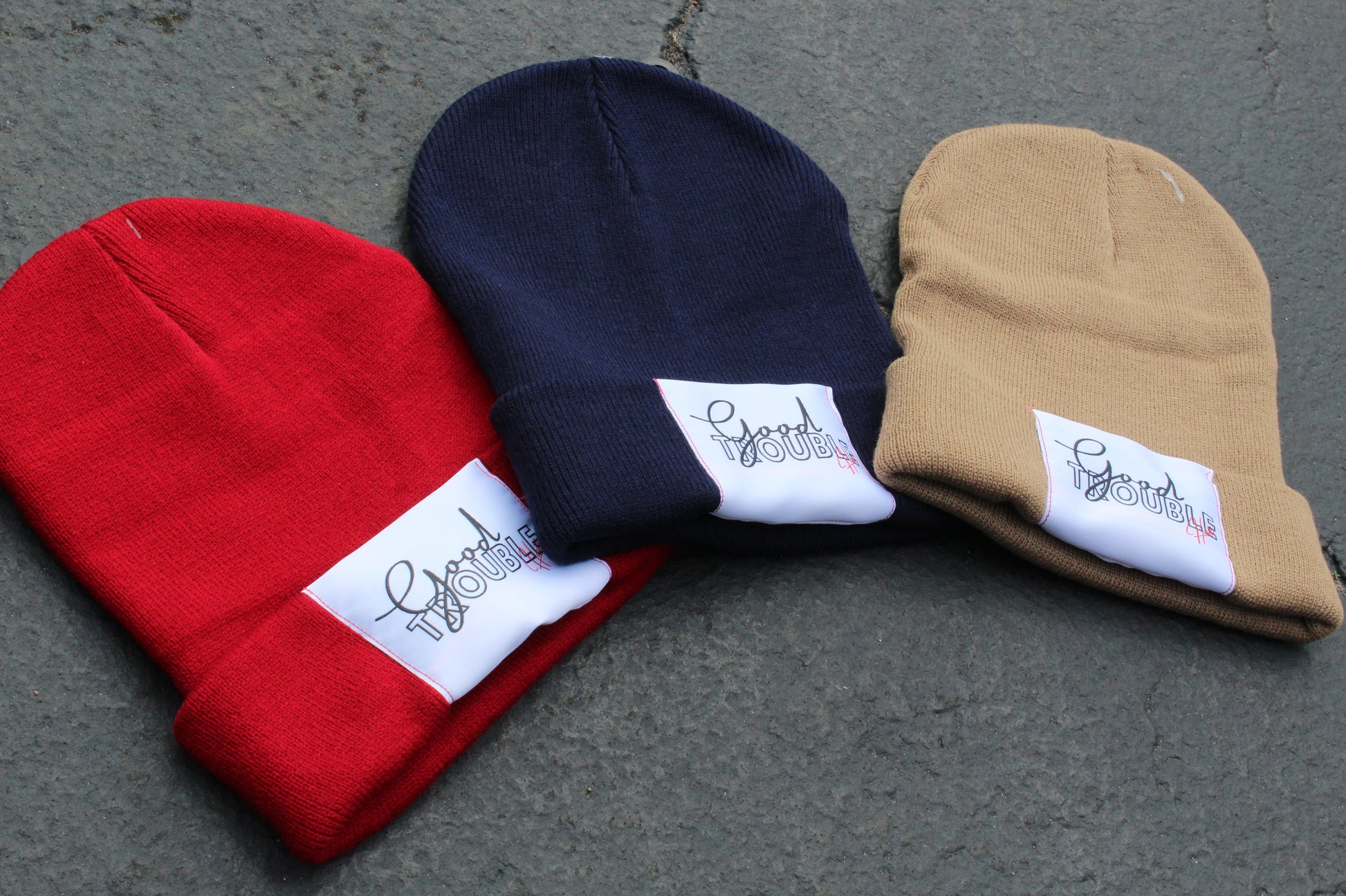 Red, Navy and Nude beanie with Good Trouble hustle Logo