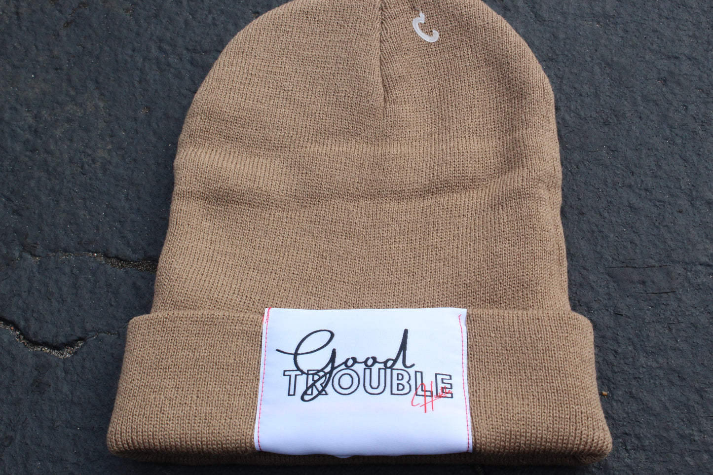 Nude beanie with Good Trouble hustle Logo